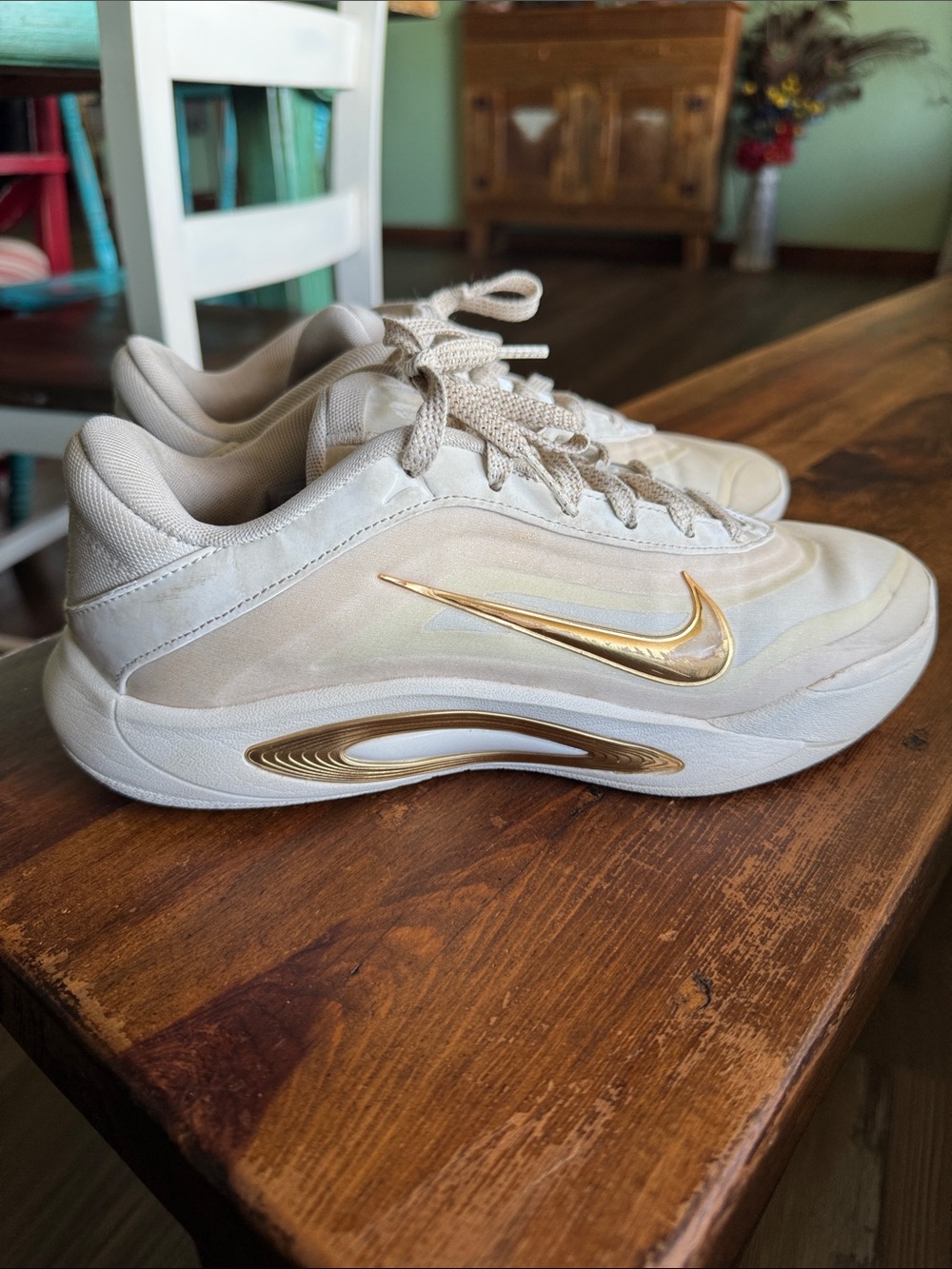 Nike white Sneakers with Gold Swoosh